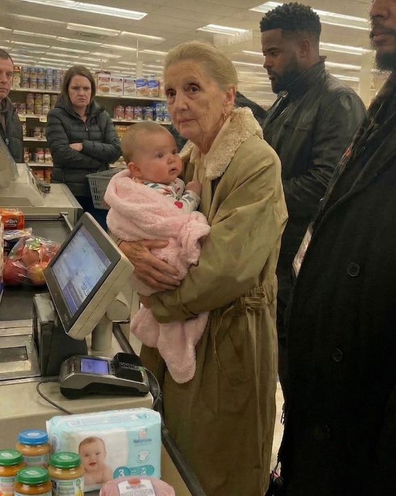 Folks were making fun of me when my card wouldn’t go through while I held my baby granddaughter—then someone behind me said, “Excuse me, ma’am… the one with the baby.”