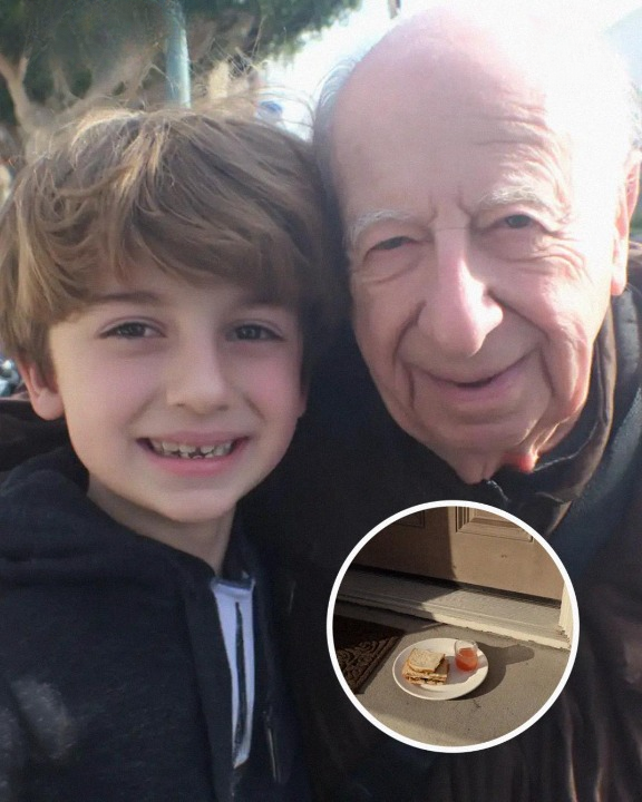My 7-year-old son kept leaving his lunch on our grumpy neighbor’s porch—then one morning, the old man opened the door holding a faded photo that left me completely stunned.