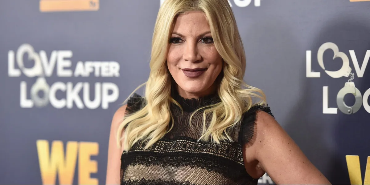 Tori Spelling and Dean McDermott come together for their daughter Stella’s graduation, sparking buzz over their looks — see photos.