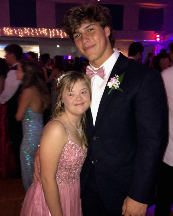 The star quarterback asked my daughter with Down syndrome to prom — but everything changed when I discovered what he had hidden in his tuxedo, and he leaned in to warn me, “Stay quiet for her sake.”